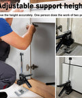 Greywolf Multi-Function Furniture Lifter With Dual Arm Jacks For Cabinet Raising And Tile Height Adjustment lifting tool in use under a cabinet.