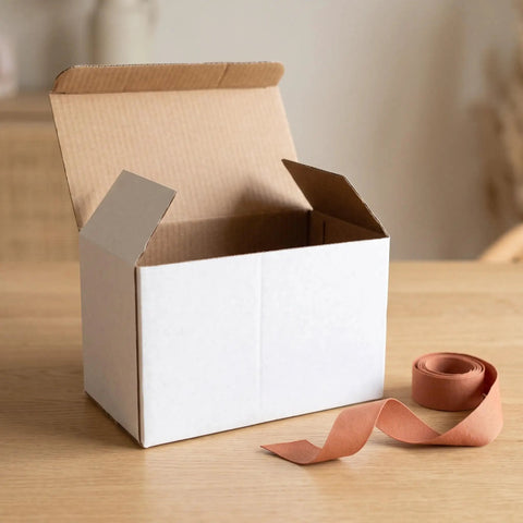 20 Pack White Corrugated Cardboard Mailing Boxes For Shipping And Parcel Packaging, Heavy Duty White Paper Parcel Boxes, Ideal For Small Business, Warehouse, Moving, 6.3 By 4 By 3.2 Inches open white corrugated box on table