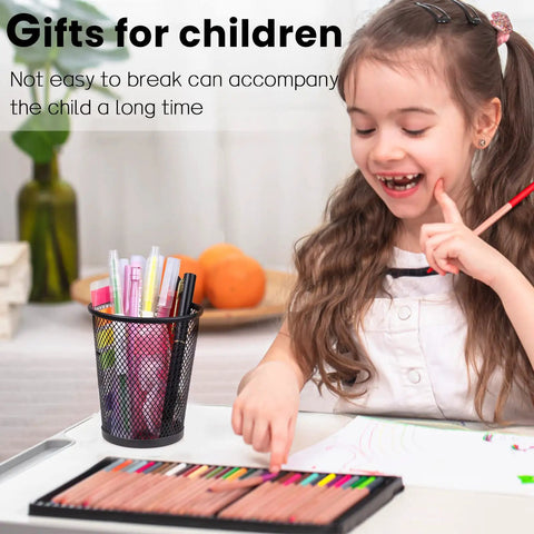 Child drawing on desk with Black Mesh Pencil Holder Metal Pen Cup Desk Organizer Set Of 6, filled with pens and markers.