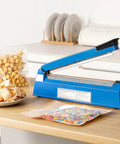 12 Inch Tabletop Impulse Heat Sealer For Plastic Bags Manual Bag Sealer With No Warmup Time And Adjustable Temperature For PE And PP Bags Extra Replacement Element Blue Grip Sealing Machine For Home Small Shop Or DIY Use on kitchen counter sealing bags with snacks