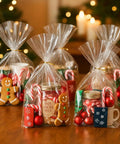 Four Clear Bottom Gusset Cellophane Gift Bags 10x14 Inches with gold twist ties, filled with treats, for party favors.