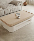Kick Back On This Sturdy Rustic Coffee Table Featuring Deep Storage Compartments Solid Wood Industrial Centerpiece Real Deal Furnishings For Modern Living Room Setups with a beige top and white base.