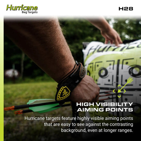 Archery setup with Two Sided Archery Bag Target Built For 425 FPS Practice with bright high visibility aiming points in a field.