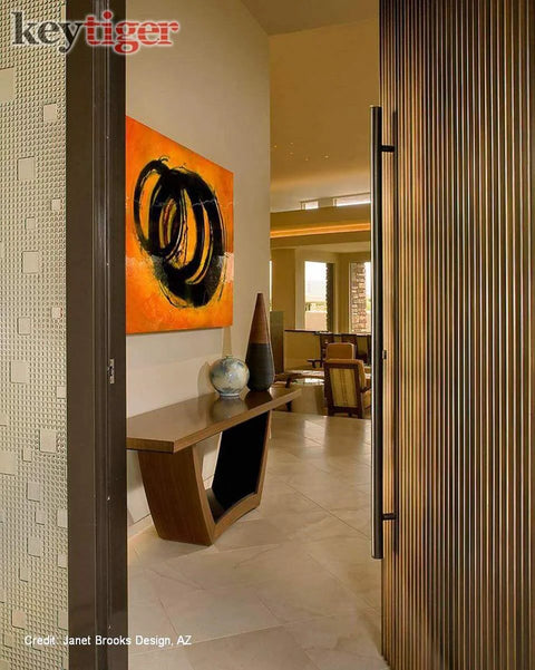 24 Inch Matte Black Stainless Steel One Sided Door Pull Handle For Wood Glass Metal Doors And Sliding Glass Shower Doors Modern Contemporary Push Pull Bar For Home Office And Commercial Use Must Have shown on an open interior door, with an art-filled hallway visible behind.