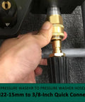 Person installing No-Fuss M22 To 3 Eighths Inch Quick Hose Connect Kit For Pressure Washers, 15mm Thread, into equipment.