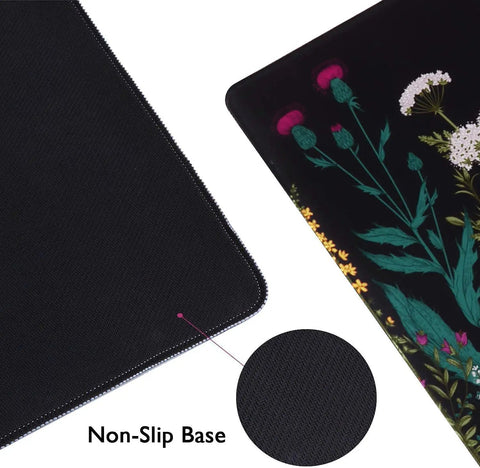 Close-up of massive extended desk pad for gaming and work XXL thirty five point four by fifteen point seven inch with stitched edges.