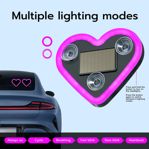 Heart Shaped Car LED Ambient Light With Solar Rechargeable Power, showing pink heart light on car with suction cups