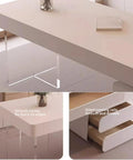 Cream L Shaped Desk With Plenty Of Storage Drawers And Smooth Rolling Wheels Floating Clear Acrylic Legs, top view with smooth edges and modern design.
