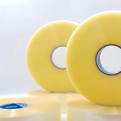 Heavy Duty Clear Packing Tape 6 Roll Bundle 2 Inches Wide By 1000 Yards Each Real Deal acrylic rolls stacked for sealing.