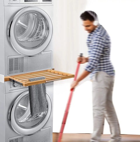 24 Inch Washer And Dryer Stacking Kit With Pull Out Shelf And Ratchet Strap showing bamboo pull-out shelf in use