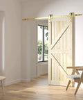 Gold Sliding Barn Door Hardware Kit With 72 Inch Track, Brushed Brass Finish, Aluminum Rail, installed in modern interior room
