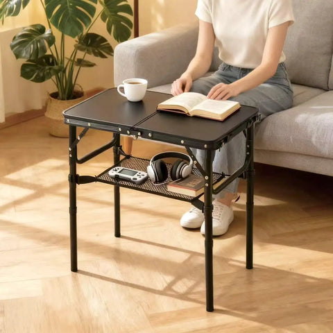 Foldable TV Tray Table With Adjustable Height, Sturdy Aluminum Sofa End Table for snacks and meals indoors next to sofa.