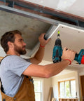 Man using Magnetic Screw Bit Holder with Hex Shank Aluminum Alloy Magnet for drywall installation