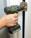 Person using Beefy 20V Cordless Drill With One Half Inch Metal Ratcheting Chuck 450 Inch Pounds Of Torque Two Speed Gear Box on a door hinge.