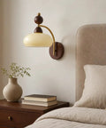 2 Pack Rechargeable Vintage Wooden Wall Sconces RGB Battery Operated Lights with warm glow on bedside wall.