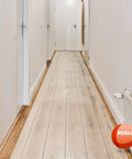Premium Clear Floor Protector Mat 27 Inch By 12 Foot Waterproof Roll for hallway, heavy-duty PVC vinyl on hardwood floor