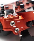 Close-up of Tandem X20R Dual Band Transmitter controls and switches, highlighting dual-band telemetry module and design details.