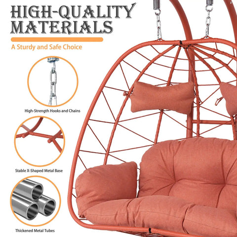 Close-up of orange-red Double Egg Chair With Stand And Adjustable Canopy showing cushions and durable steel frame.