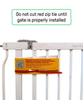 Close-up of No-Drill Expandable Baby And Dog Gate 28 To 42 Inch Wide, 30 Inch Tall, Hardware Or Pressure Mounted, with red zip tie.