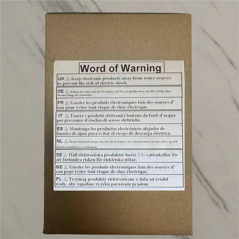 Warning label on packaging for Industrial Grade Mini Bench Drill Press With Precision Variable Speed Control, various languages.