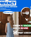 Twin Pack Bathroom Privacy Lever Lock With Large Vacant Or In Use Indicator for offices; woman stands near restroom doors.