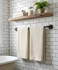 Bathroom with towels on Half Inch By Twenty Four Inch Black Malleable Iron Pipe Nipples Fittings Ten Pack Threaded Both Ends With Rust Preventive Coating