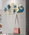 Sleek Wall Mounted Coat Rack With Extended Hook Arms For Entryway, Modern decorative design with gold finish and deep hooks for bags.