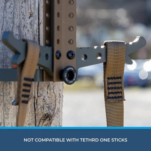 Close-up of Ape Canyon Outfitters 3 Step Aider for Hunters and Arborists, lightweight tree climbing tool secured on a tree, USA made.