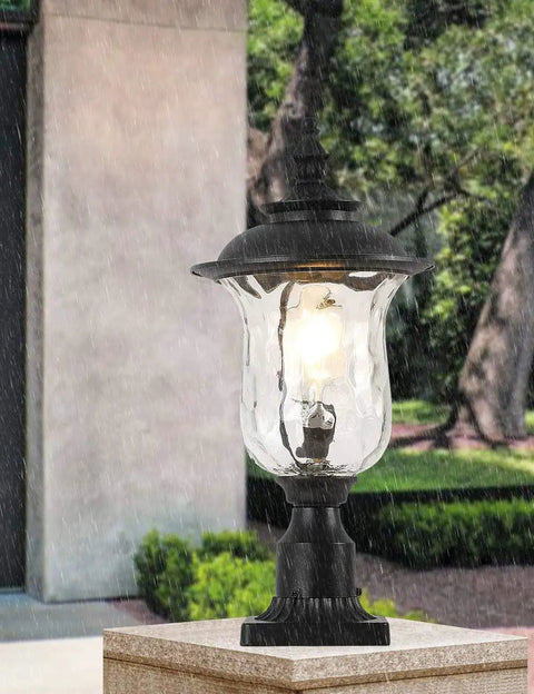Outdoor Post Light With E26 Socket, 3-Inch Pier Mount, Waterproof Black Lantern With Water Glass Shade In Garden Setting.