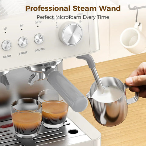 Kick Up Your Daily Grind With This Rock Solid Commercial Espresso Machine Featuring A Built In Grinder Steam Wand And Heavy Duty Tamping Kit For Flawless Lattes In Clean White, showing professional steam wand with milk jug.