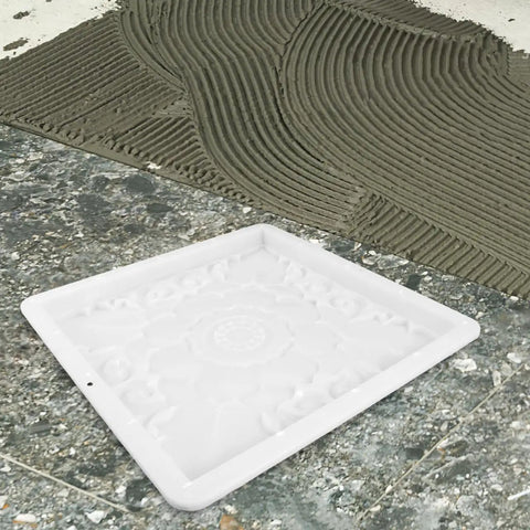 Heavy Duty Reusable Concrete Molds For Walkways And Patios Large Plastic Square Paver Molds For DIY Cement Stamps And Flagstone Forms Create Garden Paths And Patio Stones 15.7 X 15.7 X 1.4 Inches showing a top view on concrete surface
