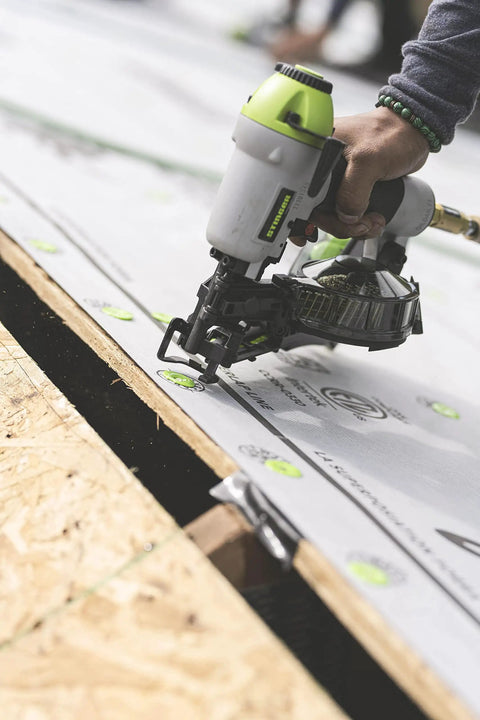 Durable Badass Pneumatic Cap Nailer Built Like Steel For Smashing Roofing Underlayment Sheets, used on site with synthetic material.