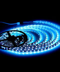 Illuminated blue Waterproof 16.4ft RGB LED Strip Lights 5050 Color Changing Rope Lights for Bedroom Decor and Holiday Parties