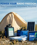 12V 20Ah LiFePO4 Deep Cycle Battery with 20A BMS for solar systems and camping gear next to tent and solar panel outdoors.