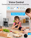 Mother and daughter using Smart Plug 4 Pack 2.4GHz WiFi Only Remote Control And Timer with Alexa to control coffee maker in kitchen.