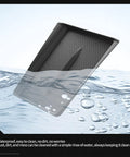 Tesla Model Y Juniper Center Console Qi Wireless Charging Pad With Non Slip Silicone Mat floating, showcasing waterproof feature.