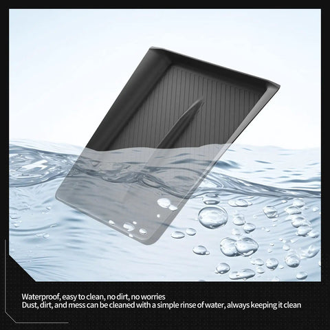 Tesla Model Y Juniper Center Console Qi Wireless Charging Pad With Non Slip Silicone Mat floating, showcasing waterproof feature.