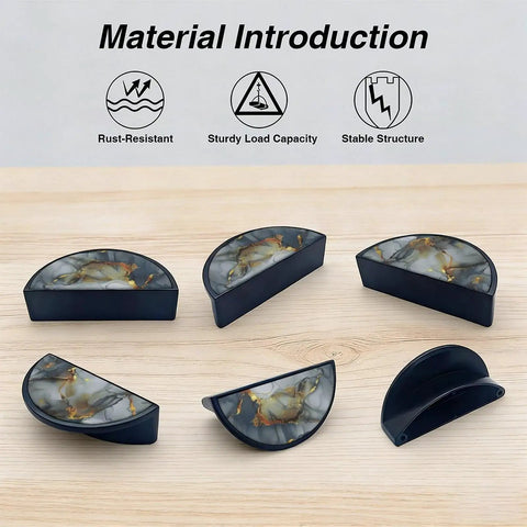 Five Two Pack Dope Grey Gold Fluid Art Cabinet Pulls With Black Semicircle Drawer Handles on wooden surface