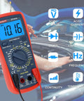 Heavy Duty Automotive Multimeter Featuring True Rms Accuracy And Cat Iii 600V Safety For Ac Dc Voltage Current Testing Temp Freq Ohms Duty Cycle Dwell Angle Capacitance Hvac Industrial Engine RPM Measurement Grease Monkey Certified digital display with test probes attached