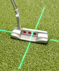 Solid Side Laser Putting Trainer For Righty Golfers Groove Plus Alignment Tool on putting green with laser guide.