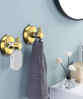 Set of 4 Brushed Gold Suction Cup Shower Hooks, 15 Lb Capacity holding towel and loofah in modern bathroom