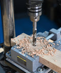Seven Sixteenth Inch HSS Brad Point Drill Bit for Wood precision drilling clean splinter-free hole in wood block on drill press
