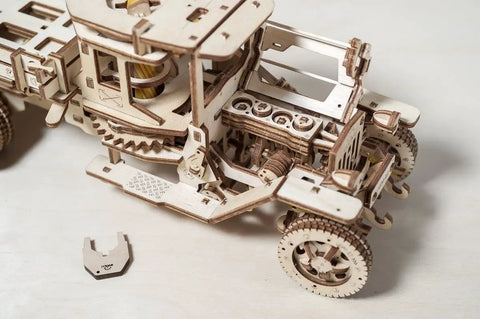 3D Self Propelled Wooden Model Truck UGM 11 Kit For Gearhead Builders And Collectors With Gear Driven Mechanism Realistic Wood Finish About 10 To 12 Hours Assembly Durable Brown Wood Craft Project That Feels Like Vintage Tech, wooden truck side view