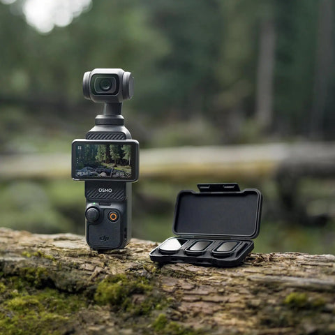Osmo Pocket 3 with Magnetic ND Filter Kit on forest log, includes ND16 ND64 ND256 in case for cinematic footage.