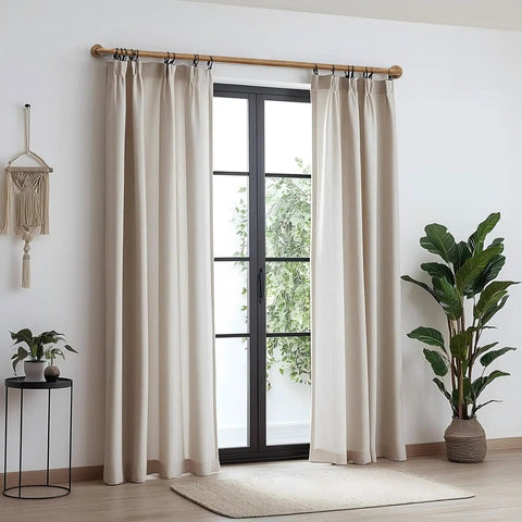 Heavy Duty Adjustable Curtain Rod Set With One Inch Diameter Wood Grain Pattern Blackout Wrap Around For Indoor And Outdoor Use 32 To 84 Inches Adjustable Length All Metal Construction For Strength And Thick Drapes supporting beige curtains in a modern living room setting.