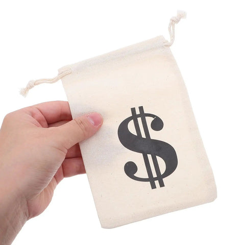 Person holding beige cotton drawstring pouch with money sign, 10x15cm, from Beige Cotton Drawstring Gift Pouches With Money Sign For Cowboy Party Decor And Birthday Party Favors, 10x15cm, Multipurpose Storage Bags, 24 Pack For Easy Gifting.