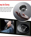 Hand holding Universal T2 Camera Photo Adapter for Telescope and Spotting Scope Eyepieces 52 to 59mm with knurled screws.