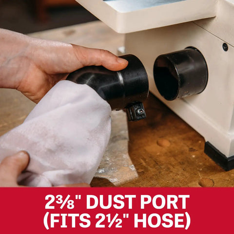 Close-up of 2⅜" dust port attaching to Heavy Six Inch Benchtop Jointer for improved dust collection.
