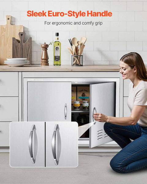 Woman installing Outdoor Kitchen Access Door 30W X 21H Inches In 304 Stainless Steel Double Doors with Vents and Handles