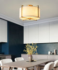 Dope Brushed Brass Four Light Flush Mount Ceiling Light With Drum Fabric Diffuser Mid Century Modern Ceiling Fixture in dining area